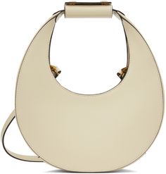 Polished leather shoulder bag in off-white. · Press-stud tab at integrated carry handle · Adjustable and detachable crossbody strap · Magnetic press-stud tab closure · Zip pocket at interior · Suede lining · H4.75 x W9 x D3 · Total height: H10.5 Supplier color: Cream Staud Shoulder Bag With Detachable Strap For Everyday, Staud Shoulder Bag With Detachable Strap For Daily Use, Staud Everyday Shoulder Bag With Detachable Strap, Staud Satchel Shoulder Bag With Detachable Strap, Staud Top Handle Shoulder Bag With Handle Drop, Staud Top Handle Bag With Detachable Strap, Luxury Staud Bags With Detachable Strap, Staud Everyday Shoulder Bag With Detachable Handle, Staud Top Handle Shoulder Bag