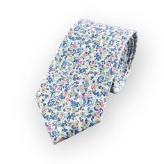 This Ditsy Floral Tie Features A Refreshing Coastal Color Palette Making It A Perfect Choice For A Wide Range Of Outdoor Wedding Styles Including Garden, Beach And Destination Weddings. The Light And Airy Floral Design Reflects The Laid-Back And Relaxed Atmosphere Of These Types Of Weddings And Would Complement The Surroundings - A Great Choice For A Groom Or Groomsman Who Wants To Add A Touch Of Personality And Style To His Outfit While Still Looking Polished And Put-Together. This Versatile Ti White Summer Tie, Classic White Ties For Spring, Classic White Spring Ties, Summer Floral Print Tie, White Floral Print Ties For Summer, Summer Floral Print White Ties, Summer Floral Print Ties, Summer Floral Print Standard Tie, Summer White Floral Print Ties