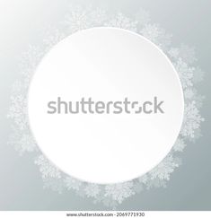 an empty white plate with snowflakes on the top and bottom, ready to be used