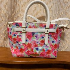 Floral Bag With Sling Almost Brand New Used Once White Shoulder Bag With Detachable Strap For Spring, White Floral Print Satchel Shoulder Bag, White Floral Print Satchel Bag, White Floral Print Shopping Bag, White Floral Print Shoulder Bag For Shopping, White Feminine Shoulder Bag For Spring, Feminine White Shoulder Bag For Spring, Multicolor Floral Print Bags For Day Out, Multicolor Floral Print Bag For Day Out