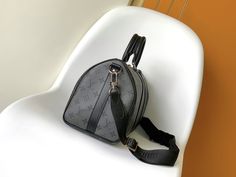 This Keepall Bandoulière 35 handbag uses Monogram Eclipse coated canvas to convey restrained style. The leather top handle, side straps and metal hardware reflect the classic heritage, and the detachable and adjustable shoulder strap makes it comfortable to wear on the shoulder. Size: 34.0 x 21.0 x 16.0 cm (LxHxW) • Monogram Eclipse coated canvas • Calfskin trim • Textile lining • metallic parts • Zip closure • Removable nameplate • Dual interior patch pockets • Shoulder strap: detachable and ad Monogram Canvas Satchel With Adjustable Strap And Double Handle, Black Monogram Canvas Satchel With Top Carry Handle, Light Luxury Black Shoulder Bag For Travel, Black Light Luxury Shoulder Bag For Travel, Black Monogram Canvas Satchel Shoulder Bag, Black Shoulder Bag With Leather Trim And Monogram Canvas, Black Monogram Canvas Satchel With Top Handle, Black Monogram Canvas Top Handle Satchel, Designer Black Satchel With Adjustable Handle