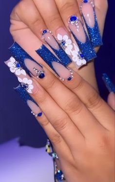 Long Nails Royal Blue, Blue Dramatic Nails, Royal Blue Bling Acrylic Nails, Quinceanera Dresses Royal Blue And Silver, Quinceanera Royal Blue Nails, Latina Nail Designs Blue, Quince Royal Blue Nails, Royal Blue Winter Nails, Royal Blue Nails Designs Coffin