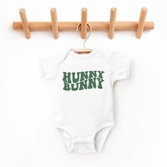 The perfect bodysuit for your perfect baby! These short sleeve bodysuits have 3 snap closure and double needle ribbed binding on neck, shoulders, sleeves, and leg openings. Machine wash cold, inside out. Air dry or tumble dry low. Uncle Onesie, Easter Onesie, Hunny Bunny, One Piece Clothing, Short Sleeve Bodysuit, Baby Bodysuit, Air Dry, Leotards, Snap Closure