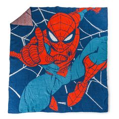 the spiderman blanket is on display in front of a white background with blue and red colors