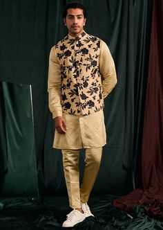 Black silk bandi with floral print. Traditional Spring Bandhgala With Floral Print, Traditional Floral Print Bandhgala For Spring, Floral Print Nehru Jacket For Festive Occasions, Black Silk Sets With Floral Print, Festive Black Floral Print Set, Spring Fitted Nehru Jacket With Floral Print, Traditional Black Floral Print Sets, Rahul Khanna, Potli Bags