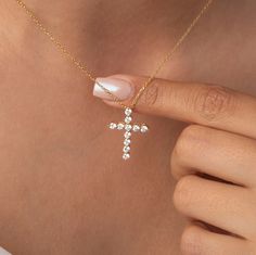 Experience the captivating allure of our exquisite 14k Gold Diamond Cross Pendant Necklace. Meticulously crafted with a seamless blend of elegance and spirituality, this breathtaking piece of fine jewelry is a true testament to exceptional craftsmanship. Alternatively, choose from our options of natural diamonds, lab-grown diamonds or dazzling moissanites at three different price points to fit your unique preferences and budget. Please check below to see specifications of each stone option. All Dazzling Hallmarked White Gold Necklace, 14k Gold Spiritual Cross Pendant Necklace, Elegant Necklace With Clavicle Chain And Cross Pendant, Spiritual 14k Gold Cross Pendant Necklace, Fine Jewelry Sterling Silver Cross, Sterling Silver Cross Fine Jewelry, Cross Diamond Necklace, Spiritual 14k Gold Clavicle Chain Necklace, Spiritual Pendant Jewelry With Diamond Accents