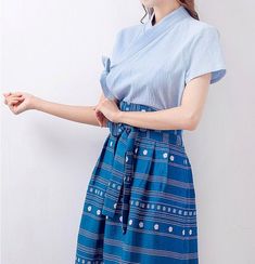 This is a Korean Modern Hanbok short sleeve blouse/shirt(Jeogori) for Women.This hanbok is modernly designed so you can wear it comfortably and beautifully.This modern hanbok is perfect dress for daily and celebrations such as parties or various events. Decorate more stylishly with accessories that go well with Hanbok. Go look hanbok accessories:https://www.etsy.com/shop/LunarJogak?ref=seller-platform-mcnav§ion_id=33148097 Go look hanbok hair accessories:https://www.etsy.com/shop/LunarJogak?ref= Fitted Stand Collar Blouse For Summer, Fitted Summer Blouse With Stand Collar, Light Blue Cotton Blouse With Short Sleeves, Light Blue Short Sleeve Cotton Blouse, Blue Fitted Half-sleeve Blouse, Light Blue Short Sleeve Blouse For Spring, Light Blue Short Sleeve Blouse For Work, Hanbok Women, Hanbok Accessories