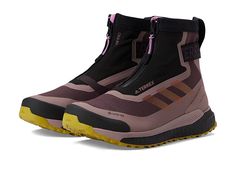 adidas Outdoor Terrex Free Hiker COOL.RDY - Women's Shoes : Shadow Maroon/Wonder Red/Pulse Lilac : Tough terrain can't stop you from hiking if you're wearing adidas Outdoor Terrex Free Hiker COOL.RDY footwear. Textile and synthetic with Primknit upper. Synthetic textile lining and insole. Gore-Tex waterproofing provides all-condition dryness. Designed to insulate your feet in cold weather stay warm with adidas COLD.RDY. Front zip closure. Round toe. Pull-tab with external heel clip. Ankle-huggin Adidas Terrex Woman, Puma Boots, Adidas Terrex Free Hiker, Tech Women, Adidas Terrex, Synthetic Rubber, Puma Fierce Sneaker, Cozy Outfit, Pull Tab