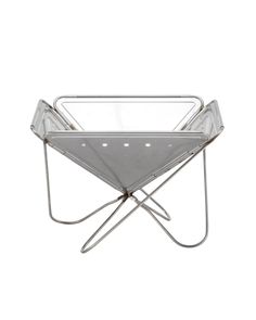 a glass tray with metal legs on a white background and an upside down shelf in the middle