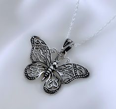 Well detailed sterling silver butterfly pendant. The butterfly is a symbol of change, joy and color. Butterflies were considered a miracle of transformation and resurrection.  In Christianity, the butterfly is the resurrection symbol. FEATURE: . Solid 925 Sterling silver Pendant.   . Solid 925 Sterling Silver chain. . Need to add charms? http://etsy.me/ZQ2KkF . Additional Meaningful Jewelry: http://www.JewelrywithAMeaning.etsy.com  I offer fine jewelry made out of 92.5% Sterling Silver, fine jewelry can last for generations, and it is often considered an investment or something worth collecting and passing down to family members. Rest assure my jewelry does not have allergic metals like nickel or lead. Fashion jewelry is not made of precious metals. Please drop me a note during checkout in Silver Butterfly Necklace In Sterling Silver, Silver Necklace With Butterfly Clasp For Gift, Silver Sterling Butterfly Necklace, Spiritual Silver Jewelry With Butterfly Charm, Sterling Silver Butterfly Jewelry, Silver Spiritual Jewelry With Butterfly Charm, Spiritual Silver Necklace With Butterfly Charm, Silver Butterfly Charm Necklace In Sterling Silver, Spiritual Silver Butterfly Necklace