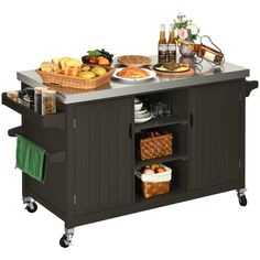 a kitchen island with food and drinks on it