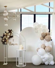 balloons and flowers are on display in the room