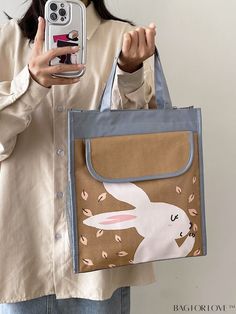 BagForLove - Bunny Pattern Canvas Tote Bag - Stylish and Durable, Ideal for Women, Moms, Teachers, Students Product Description Color Khaki Strap Type Double Handle Pattern Type Cartoon Bag Size Small Type Top Handle Bag Closure Type Zipper Style Fashionable Features High-capacity Material Polyester Composition 100% Polyester Size Chart INCH CM Bag Length Bag Width Bag Height Handle Height 11.8 inch 3.9 inch 13.4 inch 5.9 inch Bag Length Bag Width Bag Height Handle Height 30 cm 10 cm 34 cm 15 cm Details Pictures Similar Products h2 { text-align: center; } /* æ¢è¡ */ li{ white-space: normal; word-break: break-all; word-wrap: break-word; } .red-box { width: 100%; display: flex; flex-direction: row; flex-wrap: wrap; justify-content: center; } .red-box > div { width: 190px; height: 250px; ma Cute Large Capacity Lunch Bag For Everyday, Cute Large Capacity Lunch Bag, Tote Bag With Zipper, Cartoon Bag, Bunny Pattern, Bag With Zipper, Word Wrap, Reusable Grocery Bags, Canvas Tote Bag