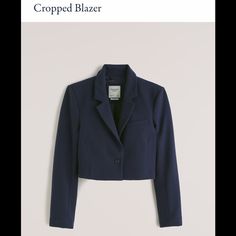 Brand New With Tags Color: Navy Blue Long Sleeved Collared Single Breasted Shoulder Pads Cropped Center Button Closure Chest Pocket Color No Longer Sold Perfect For Work / The Office! Chic Fitted Navy Blazer, Chic Cropped Blue Blazer, Chic Cropped Blue Outerwear, Chic Blue Cropped Outerwear, Chic Blue Cropped Jacket For Work, Fitted Blue Cropped Jacket, Fitted Blue Cropped Jacket For Fall, Chic Blue Fitted Cropped Jacket, Chic Fitted Blue Cropped Jacket