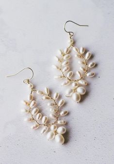 A beautiful pair of high quality freshwater pearl earrings, hand wired into pretty vines. The earrings measure approximately 2” in length and 1” in width. Please message if you require alternative sizes. The earrings are available in gold, rose gold, or silver plate (all hooks are 14k gold filled, Bridal Earrings Silver And Pearl, Bridal Earrings Hair Down Boho, Handmade Bridal Jewelry, Boho Pearl Earrings, Pearl Wedding Earrings Brides, Beaded Wedding Earrings, Pearl Bead Earrings, Unique Bridal Earrings, Boho Bridal Earrings