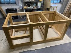 the unfinished wooden frame is ready to be built