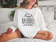 "Baseball Mom Sweatshirt, Sports Mom Gift, Baseball Mom Sweater, Baseball Mama Shirt, Baseball Aunt Sweatshirt, Cute Baseball Shirt  Hi! Welcome to✨Northstar Sweatshirt &Hoodies✨ ✨As the weather gets colder, you want clothes that keep you and your body warm. Here, Northstar Sweatshirt &Hoodies is ready to keep you warm with its unique designs. These soft and cotton sweatshirts and hoodies can be combined with anything.✨ ✨Product Features✨ 👉Medium-heavy fabric (8.0 oz/yd² (271.25 g/m 👉Loose fit White Team Spirit Sweatshirt For Baseball Season, White Sporty Sweats With Letter Print, Sporty White Sweats With Letter Print, White Sporty Sweatshirt For Baseball Season, White Letter Print Sweats Sportswear, White Sweatshirt For Sports Events, White Relaxed Fit Hoodie For Sports Season, White Sportswear Top For Leisure, White Sporty Top For Leisure