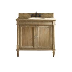 a wooden sink cabinet with two sinks and soap dispensers on the top