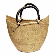 Sustainable made, this fashion staple will be with your from Spring to Fall, the neutral colors will easy blend into your everyday look. Shop today at SigridAndCo.com #fairtrade #sustainablefashion #ecofriendly #consciousliving #ecofashion #organic #neutrallook #falllook #springlook #summerlook Artisan Decor, Tote Beach Bag, Bolga Basket, Hand Painted Candles, Handmade Fair, Basket Tote, Home Decor Baskets, Market Baskets, Banana Leaf