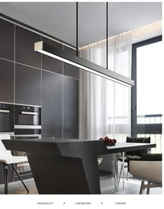 an image of a modern kitchen with black and white decor