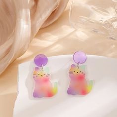 This Unique Pair Is A Wonderful Addition To Your Wardrobe And Your Style; Sure To Get Lots Of Compliments! Gsunck50t00n3xh-4 Gsun4550500mebs-4 Gsunwp50y00m6wu-3 Toothpaste Kisses, Shrinky Dink Jewelry, Shrink Plastic Jewelry, Diy Earrings Polymer Clay, Embellished Fashion, Cute Ear Piercings, Shrinky Dink, Unicorn Cat, Funky Earrings