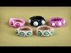 four different types of bracelets sitting on top of a table