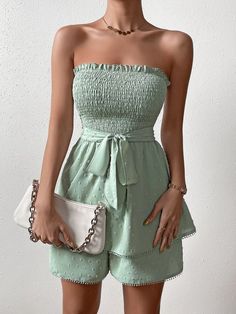 Show off your style in this Trim Shirred Belted Tube Romper. This romper features a strapless neckline, sleeveless design, and high-waisted fit for an ultra-flattering look. The mint green color is complemented by the contrast lace, frill, and shirred details for added charm. It is crafted from lightweight woven fabric with a slight stretch that allows you to move comfortably at all times. Plus, it comes with a matching belt to add definition to your waistline. Perfect for any special event or party, this romper will make sure you look stylish yet feel comfortable all night long! Features: Color: Mint Green Pattern Type: Plain Details: Belted, Contrast Lace, Frill, Shirred Length: Short Type: Tube Fit Type: Regular Fit Neckline: Strapless Sleeve Length: Sleeveless Waist Line: High Waist Fa Tube Romper, Comfy Jumpsuits, Mint Green Color, Strapless Neckline, Green Pattern, Special Event, No Frills, Green Color, Mint Green