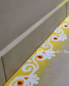 the yellow and white border is painted on the wall