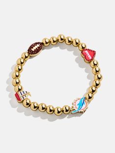 The Miami Dolphins NFL Charm Bracelet is the ultimate accessory for die-hard football fans. Each bracelet is a celebration of your favorite team, featuring the Dolphins logo along with other charms related to the team and its iconic location. Perfect for game days or everyday wear, this bracelet adds a touch of sports-inspired elegance to any outfit. This bracelet features 6mm gold ball beads. This is an officially licensed NFL product. Team-colored Sports Event Bracelets, Sporty Team-colored Jewelry For Game Day, Sporty Jewelry For Game Day, Adjustable Bracelets For Game Day, Football Season, Sporty Red Jewelry For Game Day, Dolphins Logo, Nfl Miami Dolphins, Football Gear, Miami Dolphins