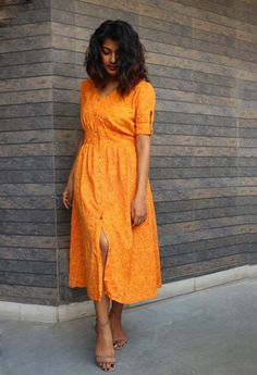 Orange hand block print maxi dress, Button down dress, Custom made, Made to order, Plus sizeThis linen dress is perfect for the ongoing Autumn. -Model height: 5'3" wearing size S-Length: 46"-Fit: Comfortable-100% CottonHand block printing is one of the oldest techniques used in India.**Note: Free Shipping time 15-21 days. Express Shipping time 5-7 days.** Orange Maxi Dress For Dress Down Occasions, Orange Cotton Dresses With Printed Motifs, Block Print Fitted Maxi Dress, Orange Cotton Sundress Maxi Dress, Bohemian Cotton Midi Dress With Buttons, Casual Block Print Maxi Dress, Fitted Block Print Maxi Dress, Casual Maxi Length Block Print Dress, Traditional Summer Dresses With Buttons