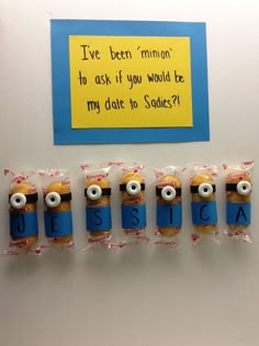 five minion magnets with the words despicade written on them in front of a post - it note