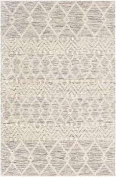 an area rug with grey and white patterns