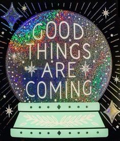 a snow globe that says good things are coming