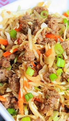 a close up of a plate of food with meat and vegetables