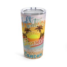 a tumbler cup with the words salt water and sunset on it