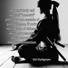 a woman sitting on the floor with two swords in her hand and an inspirational quote