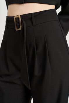 These Pleated Side Leg Pants with Belt offer the perfect addition to any sophisticated wardrobe. Crafted from lightweight fabric, the crisp pleats and leather belt make it an essential for elevated everyday style. These timeless trousers elevate any look with timeless elegance. SIZE & FIT :MODEL WEARS SIZE SMALLMODEL'S HEIGHT 5'9 Made In: IMPORTED Fabric Contents: 60% POLYESTER, 37% COTTON, 3% SPANDEXLINING: 100% POLYESTER Black Pleated Bottoms For Workwear, Black Pleated Pants For Work, Black Pleated Wide Leg Pants For Work, Black Pleated Bottoms For Business Casual, Elegant Wide Leg Pants With Belted Cuffs, Office Wide Leg Ankle-length Pants With Belt Loops, Ankle-length Wide Leg Pants With Belt Loops For Office, Chic Black Belted Wide Leg Pants, Elegant Belted Wide Leg Pants