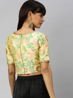 Woven cream crop top online for women which is crafted from brocade fabric with stunning woven fancy work. Floral Embroidered Brocade Sets, Fitted Cropped Choli, Fitted Festive Crop Top, Brocade Top For Wedding, Traditional Cropped Summer Crop Top, Festive Summer Crop Top, Fitted Embroidered Top With Zari Work, Traditional Fitted Cropped Crop Top, Fitted Brocade Top With Self Design