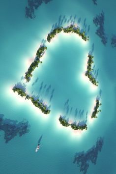 an aerial view of a heart shaped island