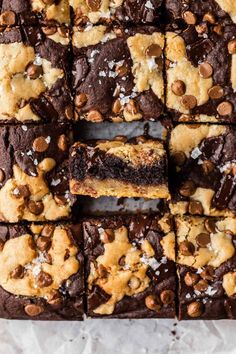 chocolate chip brownies cut into squares on top of parchment paper