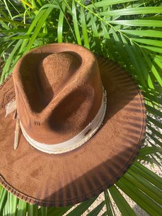 Each design is handcrafted with love in Mexico. Due to the nature of handmade items, no two pieces will be exactly the same. Sizes: M: Circumference is 58cm and fits most head sizes. L: Circumference is 62cm. Both sizes include an adjustable string inside for a secure fit. Artisan Fedora Panama Hat For Kentucky Derby, Adjustable Rustic Fedora, Rustic Adjustable Fedora, Western Brown Boater Hat With Flat Crown, Adjustable Wide Brim Rustic Fedora, Artisan Fedora With Curved Brim In Toquilla Straw, Adjustable Rustic Fedora Hat, Artisan Toquilla Straw Hat With Short Brim, Artisan Brimmed Toquilla Straw Fedora