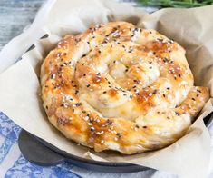 a close up of a bread in a pan on a table