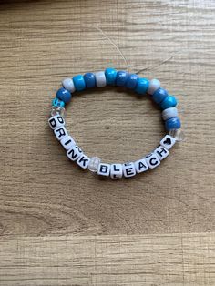 Hand made beaded Bracelet! One size fits all (let me know in the personalization tab if you would like it to be on the bigger or smaller side). I use a clear elastic band that can stretch. Nail polish is used to seal the string together. Let me know if you would like a color other than blue :) Funny Best Friend Bracelets, Funny Clay Bead Bracelet, Best Friend Kandi Bracelets, Word To Put On Bracelet, Random Bracelet Ideas, Cute Bracelet Making Ideas, Funny Bead Bracelets, Sister Bracelet Ideas, Funny Pony Bead Bracelets