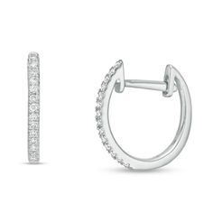 Top off any look in sparkling style with these diamond huggie hoop earrings. Created in cool 10K white gold, each on-trend hoop showcases a ribbon of shimmering diamonds that fits snuggly against the ear lobe. Captivating with 1/10 ct. t.w. of diamonds and a bright polished shine, these earrings secure with hinged backs. White Gold Earrings Zales, Love Sparkle, Huggie Hoop Earrings, Earring Backs, Diamond Stone, White Metal, Stone Settings, Designer Earrings, The Ear