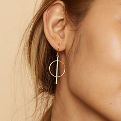 Like abstract sculptures you’d find at an art show, our Gallery Drop Earrings deserve to be on display. Solid gold bars pierce oversized open circles to create a uniquely refined look that makes an elegant statement. The Finer Points: Metal: 14k Solid Yellow Gold Construction: French Hook Dimensions: 1.7" Total Length  Weight: 1.7 Grams Gold Origin: Crafted in Vicenza, Italy Gold Gallery, Gold Bars, Sparkly Things, Gold Price, Gold Bar, Abstract Sculpture, Jewelry Business, On Display, Art Show