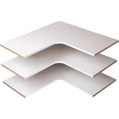 three pieces of white paper stacked on top of each other, with one piece missing