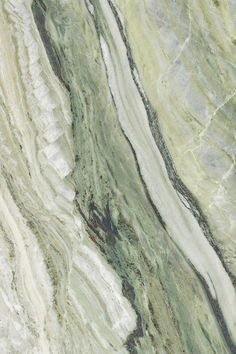 an image of marble that looks like it has been painted green and white with black streaks