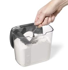 This plastic container holds a standard 1 lb bag of powdered sugar. Its capacity is 1.3L. Removable dusting spoon and leveler that conveniently snap inside the lid. Silicone seal creates airtight storage for lasting freshness. Hinged lid flips to easily fit in dishwasher. Powdered Donuts