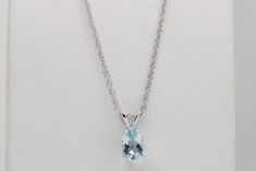 Delight in the elegance of our 14K White Gold Genuine Aquamarine Pendant, showcasing a 7x5mm gemstone, skillfully handcrafted by our artisanal goldsmith at Jewelry By You. Elegant Diamond Cut Gemstones For Formal Occasions, Elegant Diamond Cut Gemstones For Formal Events, Elegant Pear-shaped Gemstones For Formal Occasions, Elegant Polished Diamond Gemstones, Elegant Pear-shaped Gemstones For Anniversary, Elegant Round Cut Gemstones With Vvs Clarity, Elegant White Blue Topaz Jewelry, Elegant Diamond Cut Gemstones For Anniversary, Elegant Round Cut Vvs Clarity Gemstones