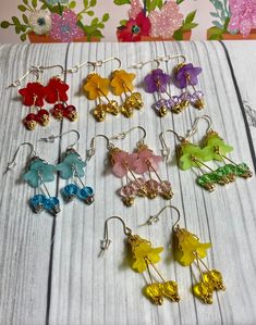 Vibrant Color Acrylic Lilies Flower Earrings - Lucite Flower Earrings - Bell Flower Earrings - Fairy flower Earrings  These delicate vibrant lily flower earrings are unique and will give you an elegant feeling when your wear them on any occasion or can be given as a gift to family and friends.  Available in 7 colors: 1- Light Blue 2- Light Green 3- Lavender  4- Yellow 5- Pink 6- Mustard  7- Red Whimsical Dangle Earrings With Flower Charm, Adjustable Multicolor Earrings With Flower Charm, Adjustable Multicolor Flower Charm Earrings, Whimsical Dangle Flower Earrings, Whimsical Multicolor Flower Charm Earrings, Whimsical Adjustable Flower Charm Earrings, Gold Whimsical Flower-shaped Earrings, Whimsical Gold Flower Earrings For Party, Whimsical Multicolor Flower-shaped Earrings